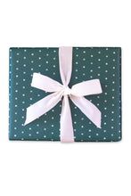 Load image into Gallery viewer, White on Green Snowflakes Holiday Wrapping Paper